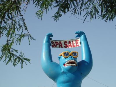 Giant blue gorilla sells spas.
