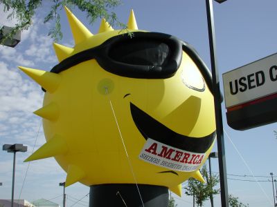 Giant sun sells Toyotas.
